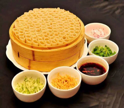 山西蒸笼里面的艺术感,远看像一幅抽象画,原来是一道美食小吃